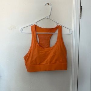 Orange Fabletics sports bra